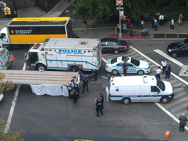 Aerial view of fatal accident investigation on Sixth Ave