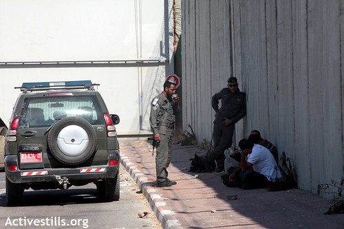 Palestinian men detained by Israeli Border Police on the last Friday in Ramadan 17 Aug 2012