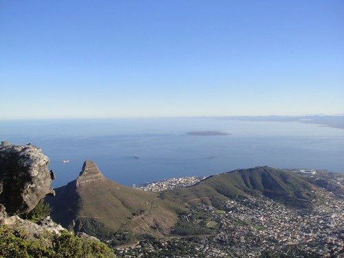 Lion's Head and Signal Hill from the summit of Table Mountain with Robben Island in Table Bay, Cape Town, South Africa