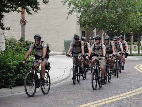Police officers on bikes traveling in packs