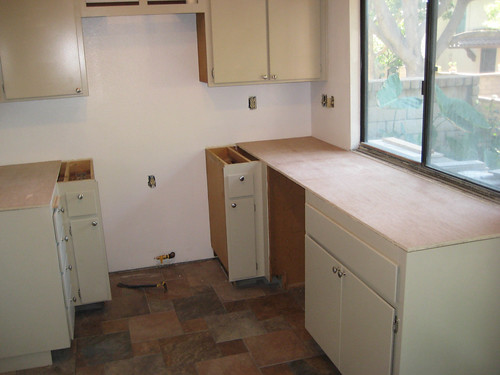 Kitchen waiting for countertops and sink