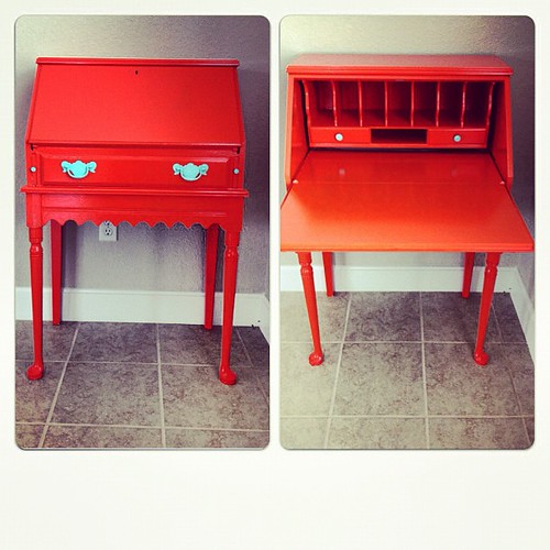 My new desk. My last one got broken the last time We moved. So I criagslisted a new one and painted it orange.