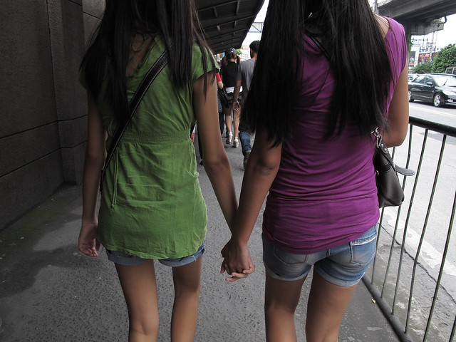 two girls holding hands 061712
