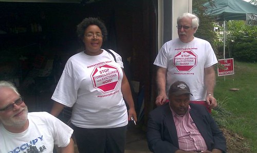 Jennifer Britt standing with supporters Pat Driscoll and Kevin Carey sitting, along with David Sole standing. Britt is fighting Fannie Mae to halt an illegal eviction. (Photo: Abayomi Azikiwe) by Pan-African News Wire File Photos