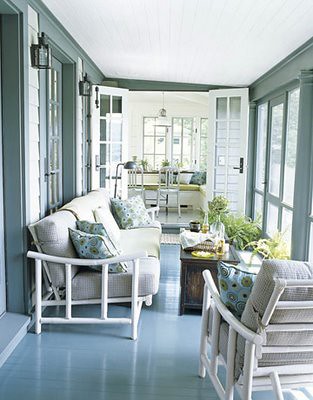 screened porch sunroom_blue white painted floor_outdoor rooms_house beautiful