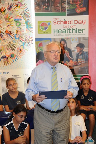 US Kevin Concannon presents a certificate of appreciation to Miami-Dade County School Superintendent Alberto Carvalho at North Beach Elementary School, Miami, FL, on August 23, 2012. (USDA photo by Debbie Smoot).