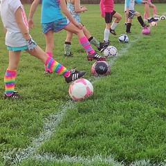First grade girls playing #soccer = colorful socks
