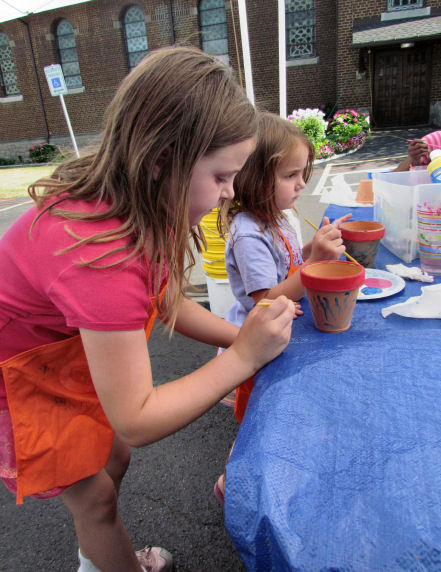 Girls Painting Pots at Farmers Market