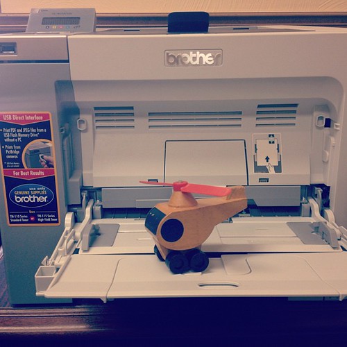 Apparently the printer's manual feed tray doubles as a helicopter's landing pad...who knew?