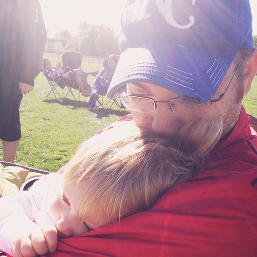 Snuggling at early morning soccer.