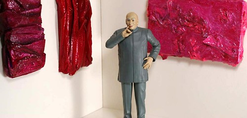 Austin Powers Dr. Evil action figure with miniature paintings by Tiffany Gholar