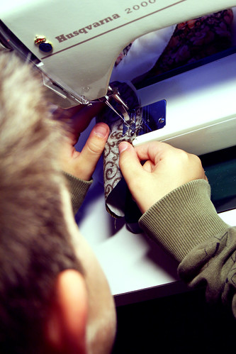 My son sewing