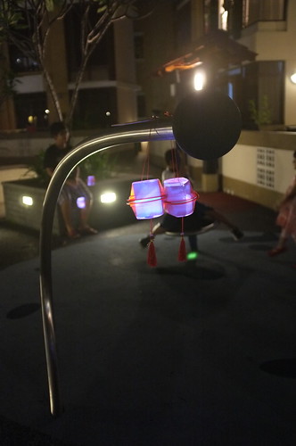 playground at night, with lanterns