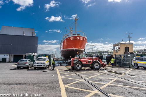 Trawler Being Lifted From Howth Harbour And Then Transported To The Boat Yard For Maintenance by infomatique