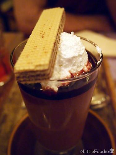 Chocolate mousse with Maraschino cherry jam and cream