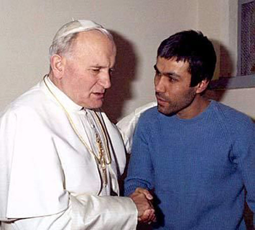 Pope John Paul and the man who tried to kill him.