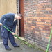 Neighbourhood Warden weeding Chatsworth St