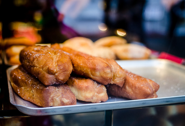 Fried donuts through a window in London's Chinatown.