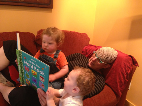 Cousins reading with Grandma