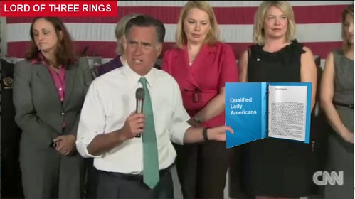 Mitt Romney in front of a group of women holding a binder. Text reads Lord of Three Rings