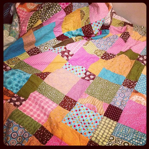 the quilt is finally bound and washed and on my bed!