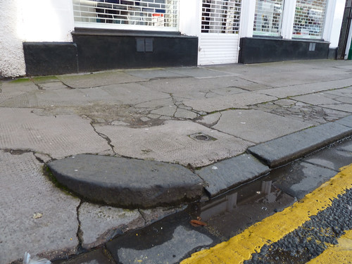 Section of Uneven Pavement Outside Hosie Electrical Store 302-4 Brook Street