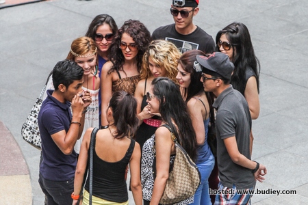 A Man Getting A Surprise Swarm Of Girls