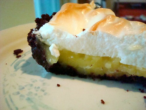 Lemon meringue pie in a chocolate cookie crust