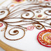 Brown, Orange, Yellow and Red Flowers and Swirls Embroidery - close-up