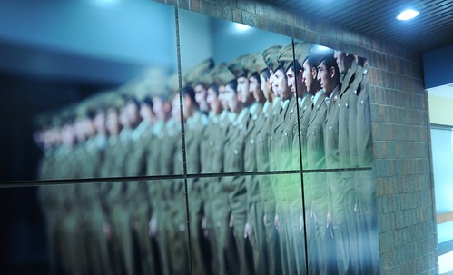 Photo wall, military officers in green uniforms, Motorola Solutions, Schaumburg, Illinois, USA by Wonderlane