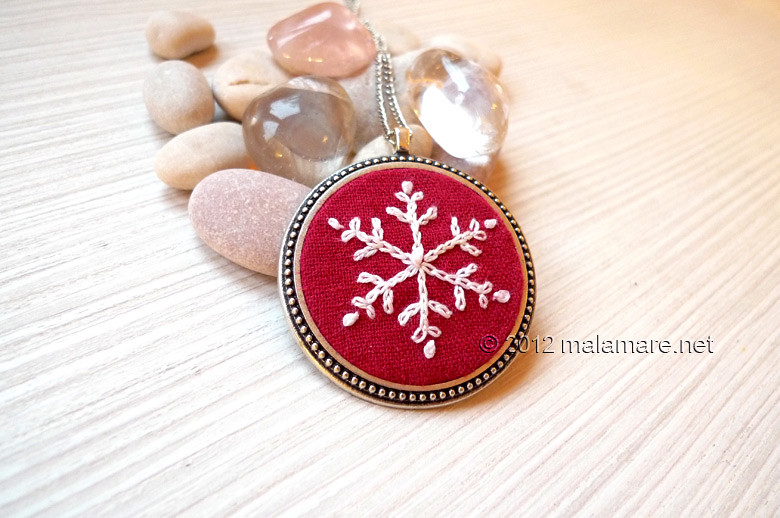 hand embroidered snowflake pendant