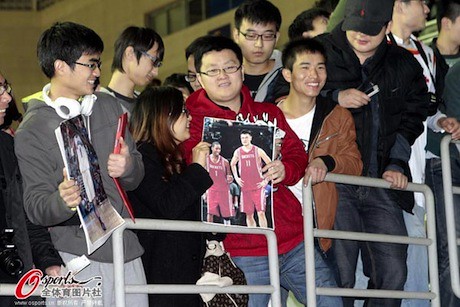 December 2nd, 2012 - Tracy McGrady fans await his arrival in Shanghai to play Yao Ming's Shanghai Sharks