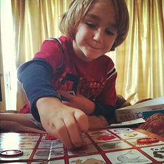 Playing Sequence with Mama cause he went bankrupt in the Monopoly marathon #hsmommas #instachristmas #mobsociety