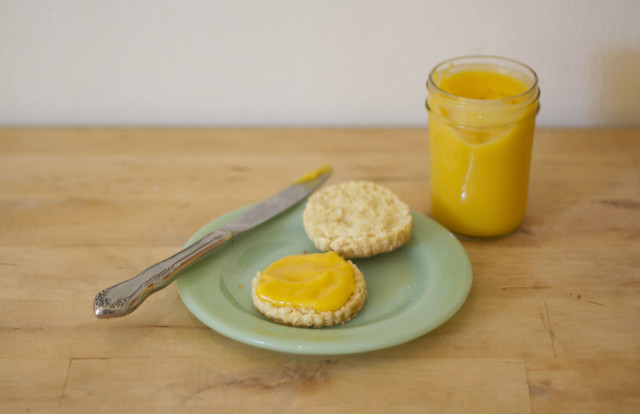 orange curd on a biscuit