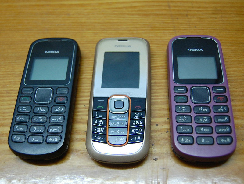3rd hand mobile   Nokia Asha 300 fullbox mới mua 2310 tặng kèm bao da