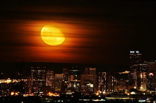 Moonrise Over Denver by Denver Sports Events
