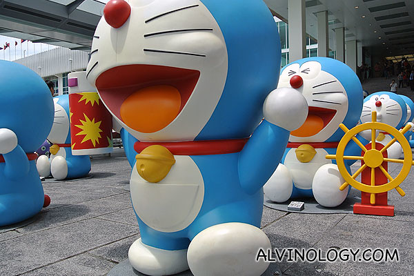 Doraemon with a spray can and a sailing one behind