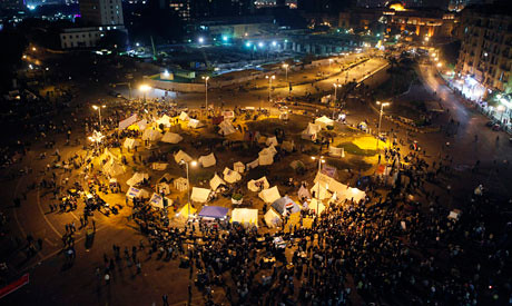Egyptians occupy the center of Cairo amid protests against President Morsi's decrees. The people are against the further usurpation of power by the government. by Pan-African News Wire File Photos