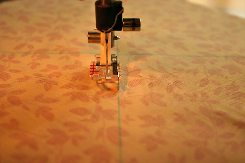 Sew a scant 1/4" on either side of the lines