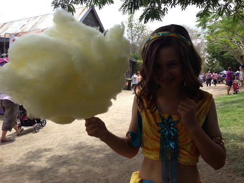 Girl with fairy floss at markets