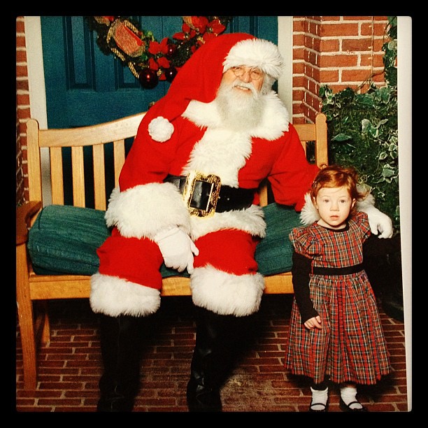 The year before wasn't much better. She looks so scared!   #santa #terror #christmas