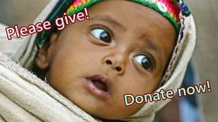Baby with GIVE NOW