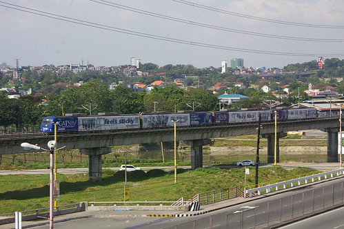 Light Rail Transit Authority LRT2-train(GATSBY COLOR) near Santolan station, Pasig, Philippine /Dec 30, 2012