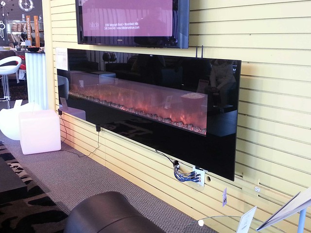This faux fireplace from Hillside Furniture requires no wood, but gives off heat!