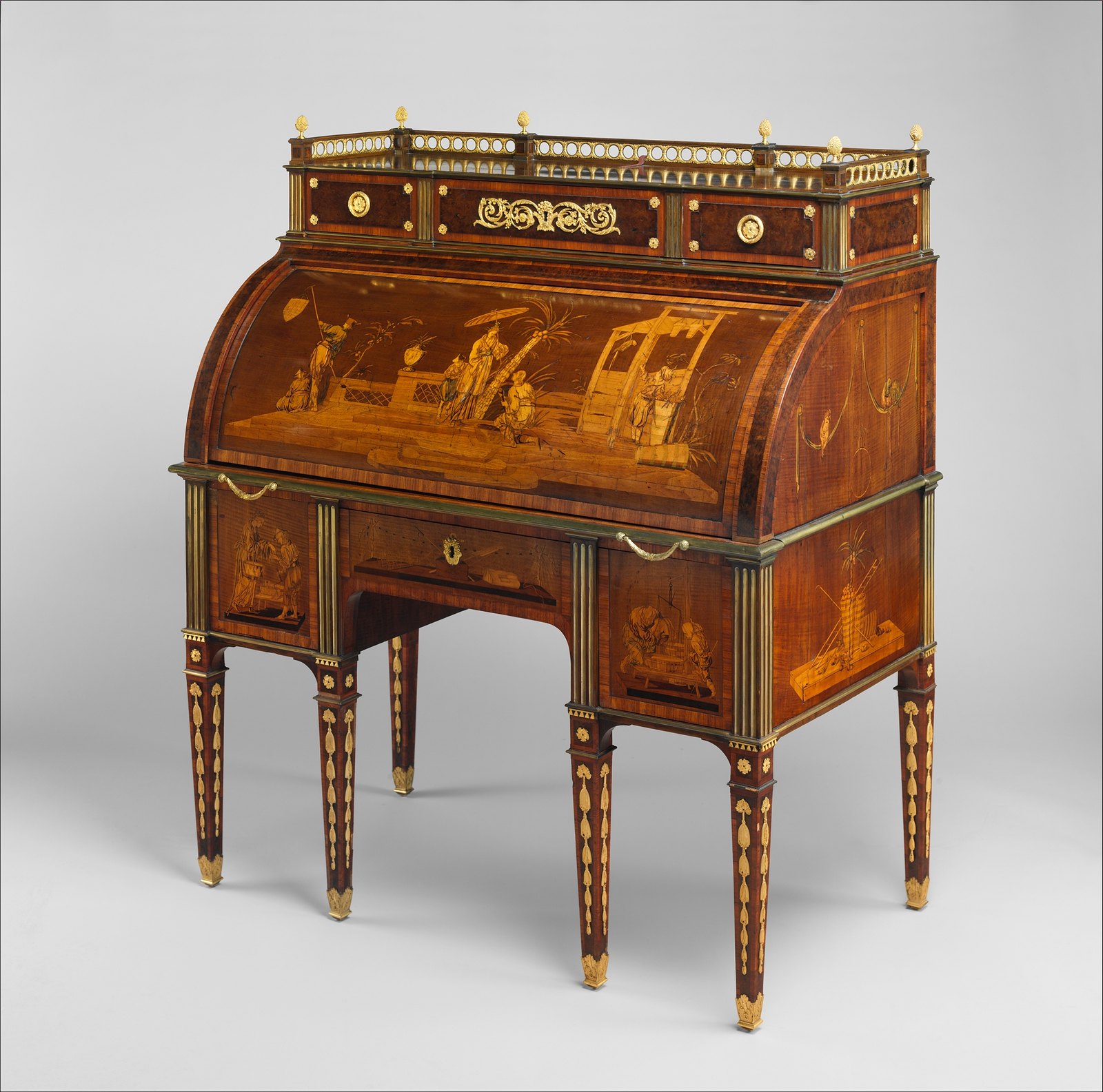 1776 Rolltop Desk. German. Oak, cherry, pine, mahogany, veneered with maple, burl woods, holly, hornbeam (all partially stained), tulipwood, mahogany, and other woods; mother-of-pearl; partially gilded and tooled leather; gilt bronze, iron, steel, brass, partially gold-lacquered brass. metmuseum
