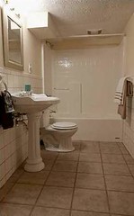 Lower level bathroom with tile flooring
