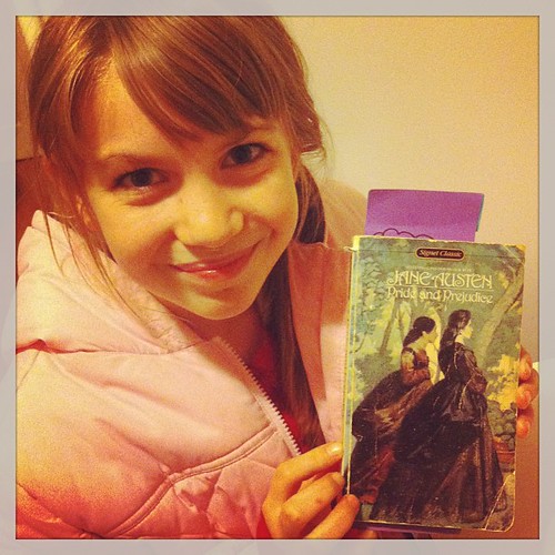 So proud that 11 year old Laura is reading her first Jane Austen novel. #books #smiles