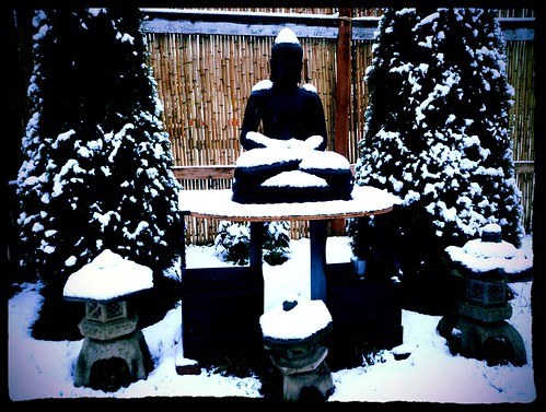 Meditating Buddha statue, snow, Japanese lanterns, trees, bamboo fence, A Garden for the Buddha, Seattle, Washington, USA by Wonderlane