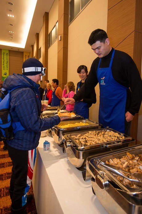 January 31st, 2013 - Yao Ming serves breakfast to Special Olympics athletes with wife Ye Li