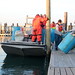 December 3, 2012 – Crews return to dock with collected drums and containers